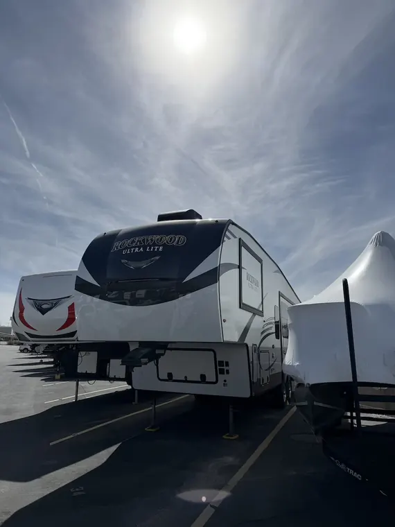 Travel trailer on a service call in an open lot